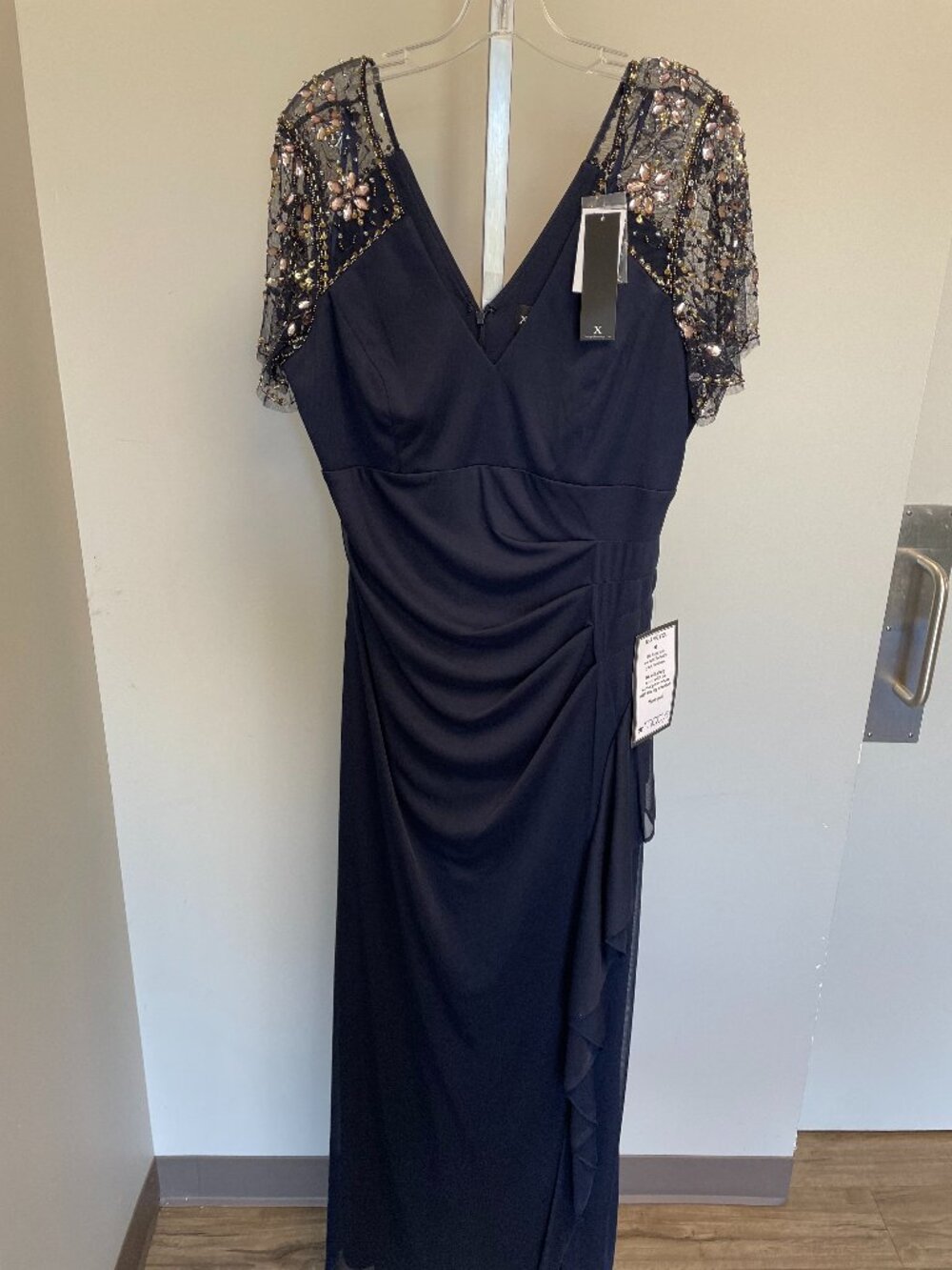 Elegant Black Evening Gown with Embellished Cap Sleeves